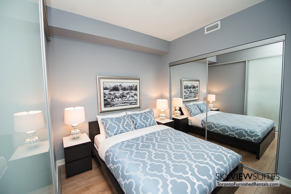 King West corporate rentals toronto blue bedroom