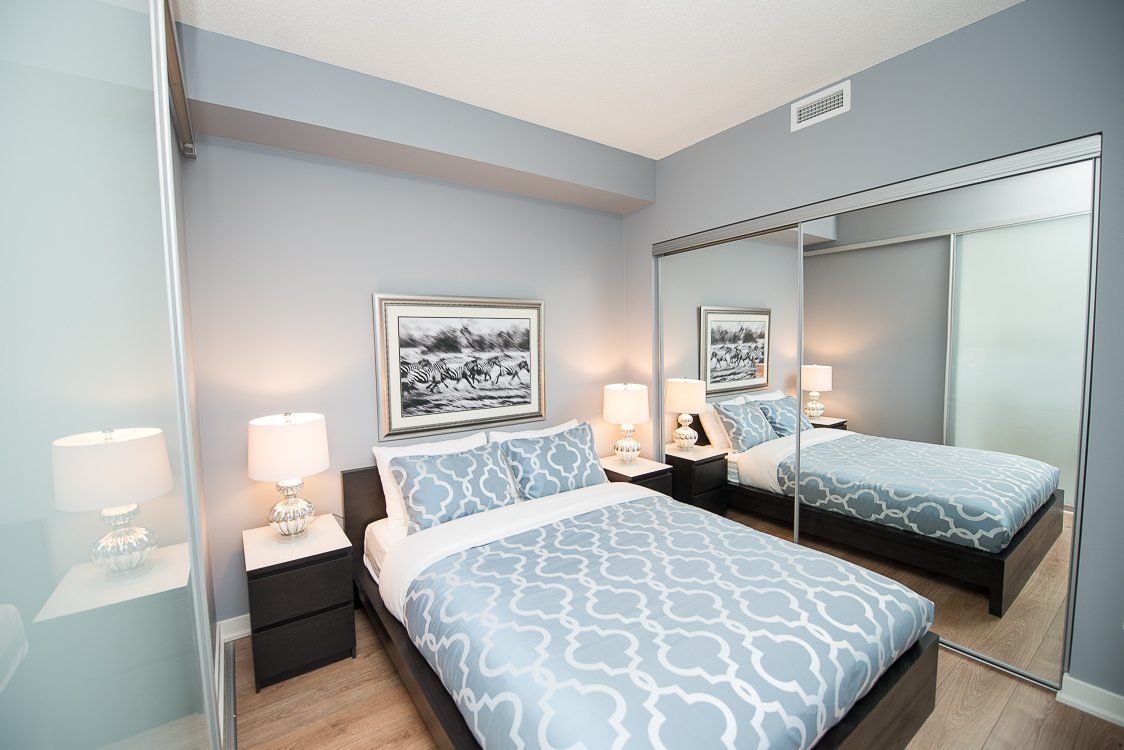 King West furnished blue bedroom