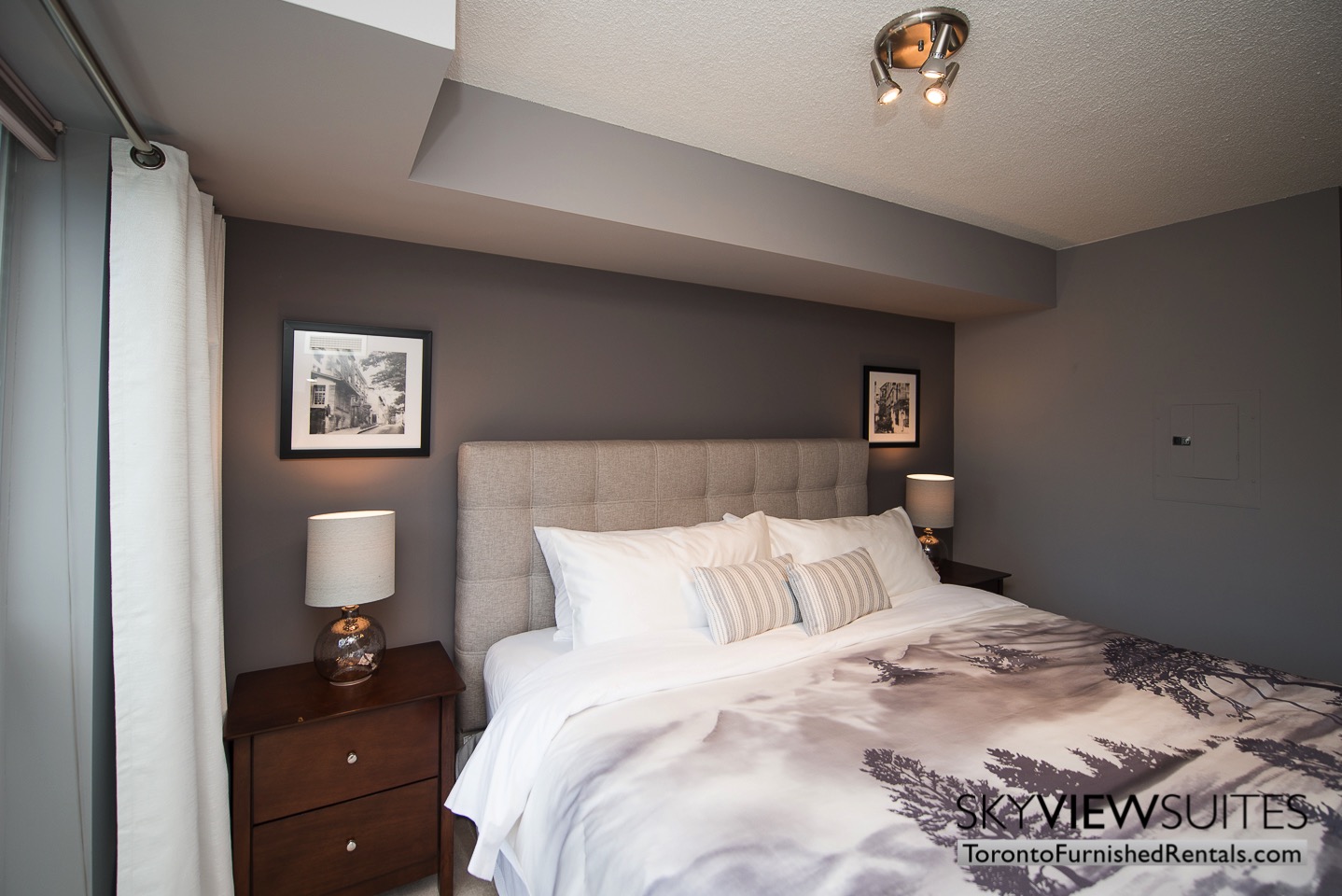 Adelaide & Sherbourne executive rentals toronto gray bedroom wall