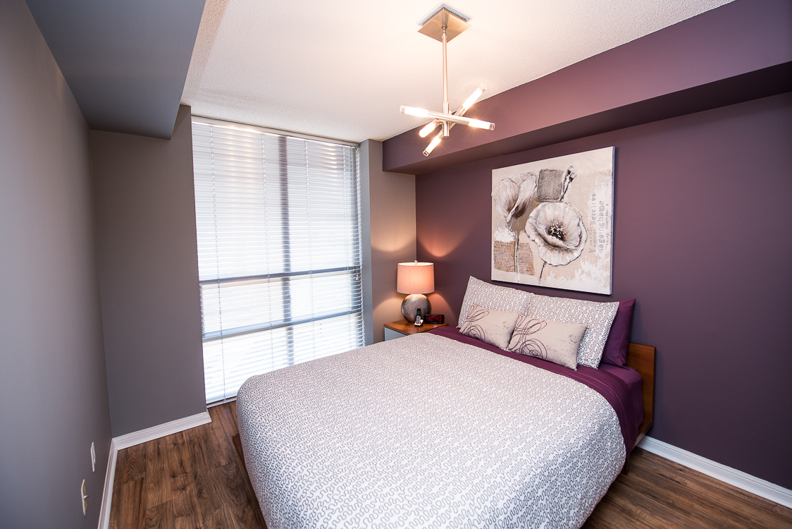 Adelaide & Sherbourne executive rentals toronto purple bedroom