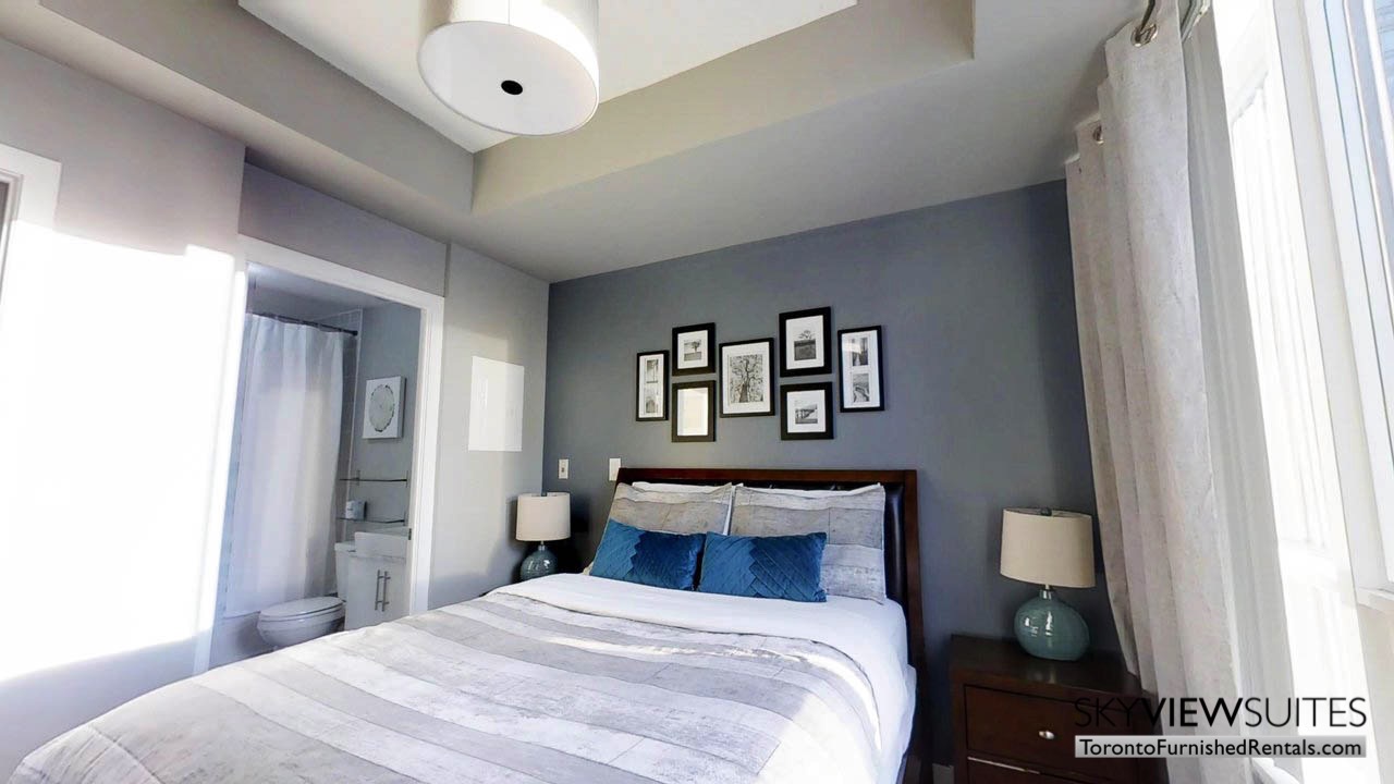 furnished rentals toronto york and bremner bedroom with en suite bathroom