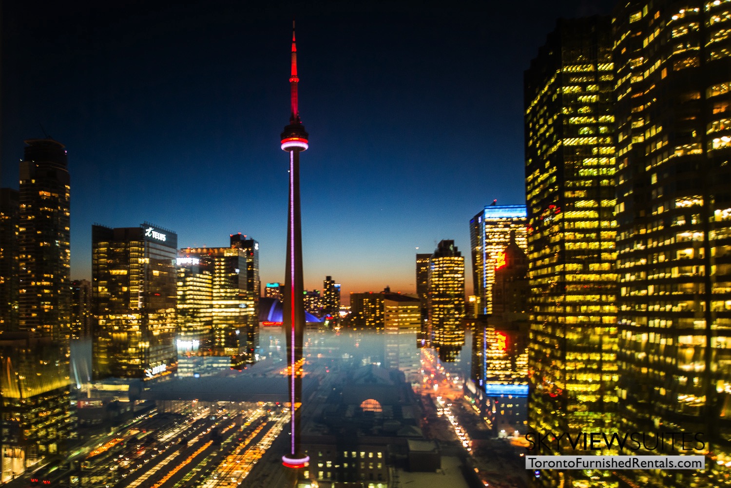 Yonge & Front serviced apartments toronto skyline evening