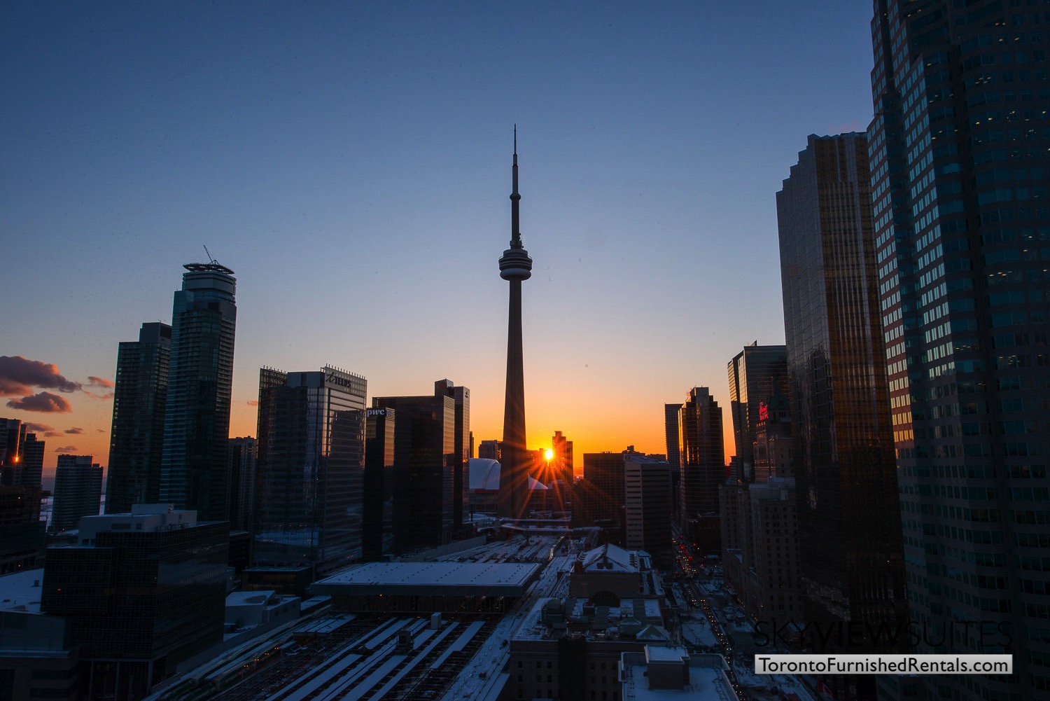 Yonge & Front serviced apartments toronto skyline sunset