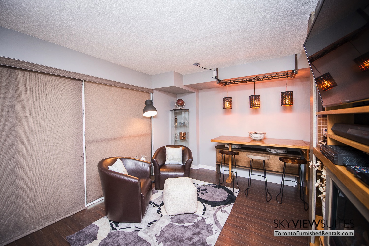 352 Front St. W., Toronto furnished rental table in living room