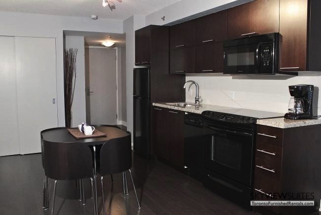 furnished apartments toronto boutique kitchen and dining table