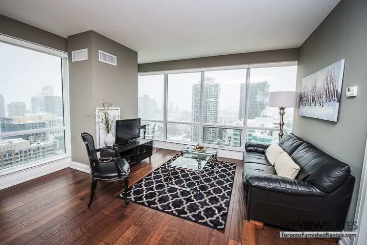 King and Spadina serviced apartments toronto living room with television