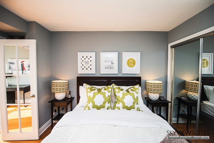 serviced apartments toronto marina del ray bedroom with green pillows and lovely art