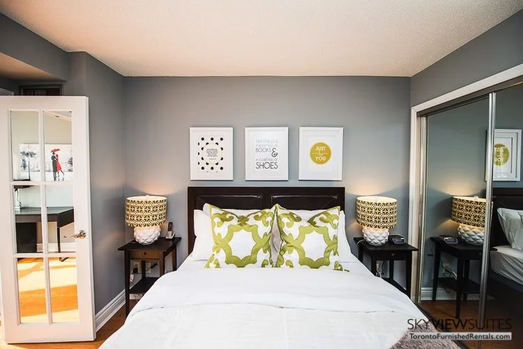 serviced apartments toronto marina del ray bedroom with green pillows and lovely art