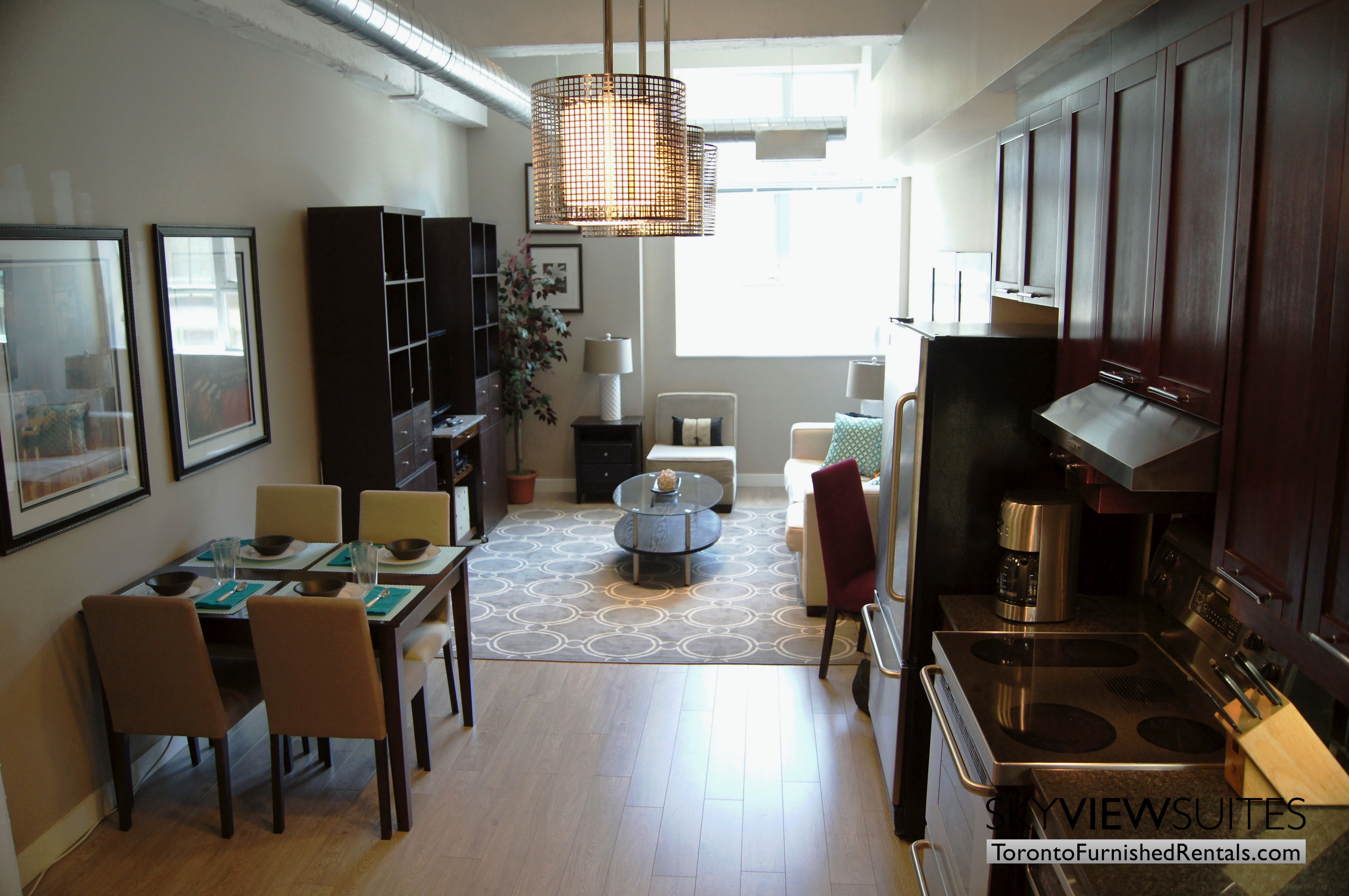 Church and Dundas toronto corporate housing living room and kitchen view