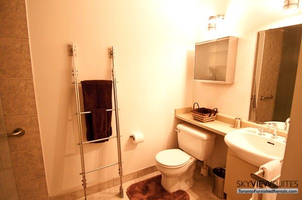 Church and Dundas toronto corporate housing bathroom with hanging towel