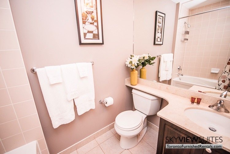 furnished suites toronto Neptune bathroom with white walls