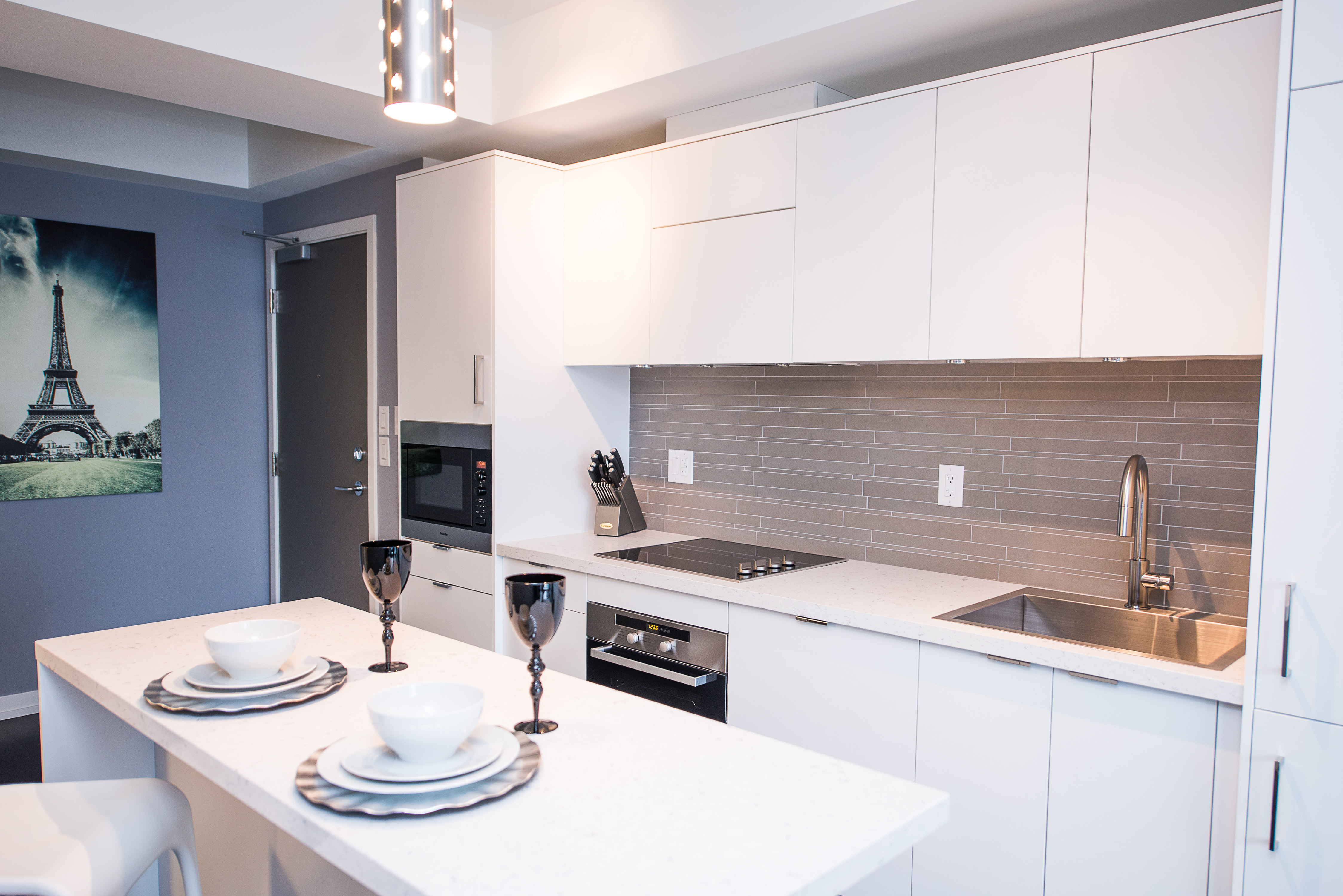 corporate rentals toronto king and john kitchen with island