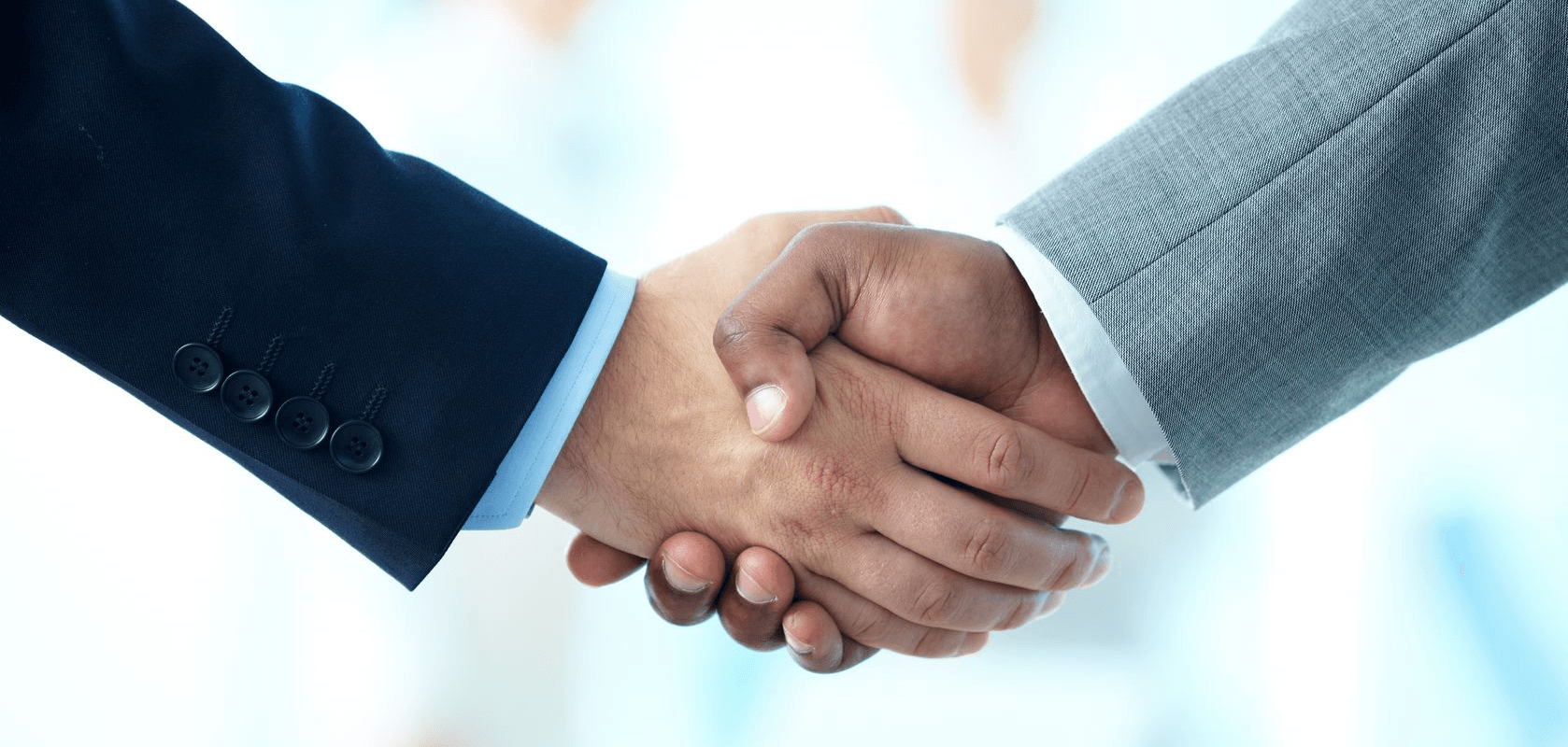 corporate housing toronto two businessmen shaking hands
