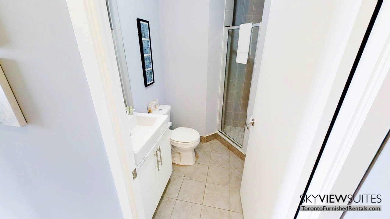 short term rentals Toronto Maple Leaf Square bathroom with sink toilet and shower