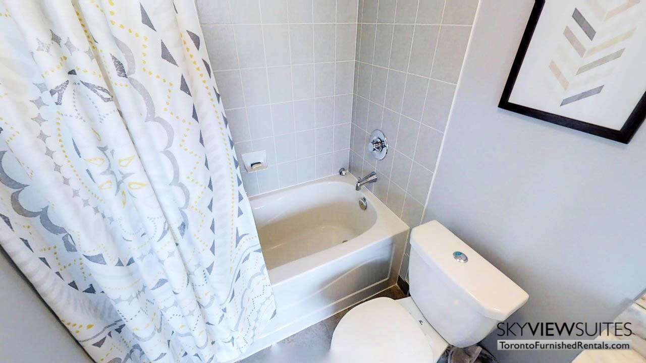 short term rentals Toronto Maple Leaf Square bathroom with bathtub