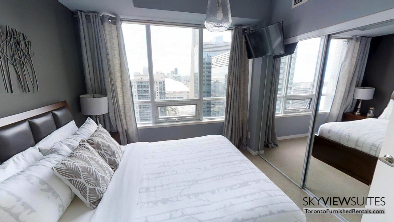 short term rentals Toronto Maple Leaf Square bedroom with view of city