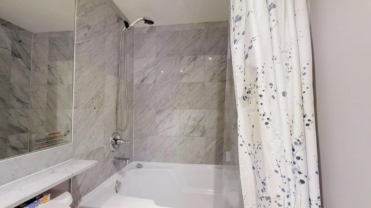 University plaza toronto furnished apartment shower and tub