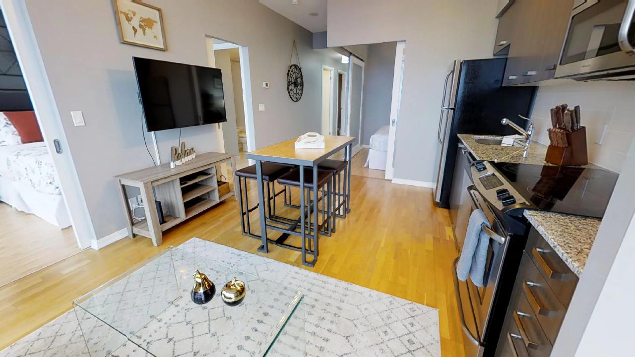 living room, and kitchen, in a toronto furnished apartment (burano condos)