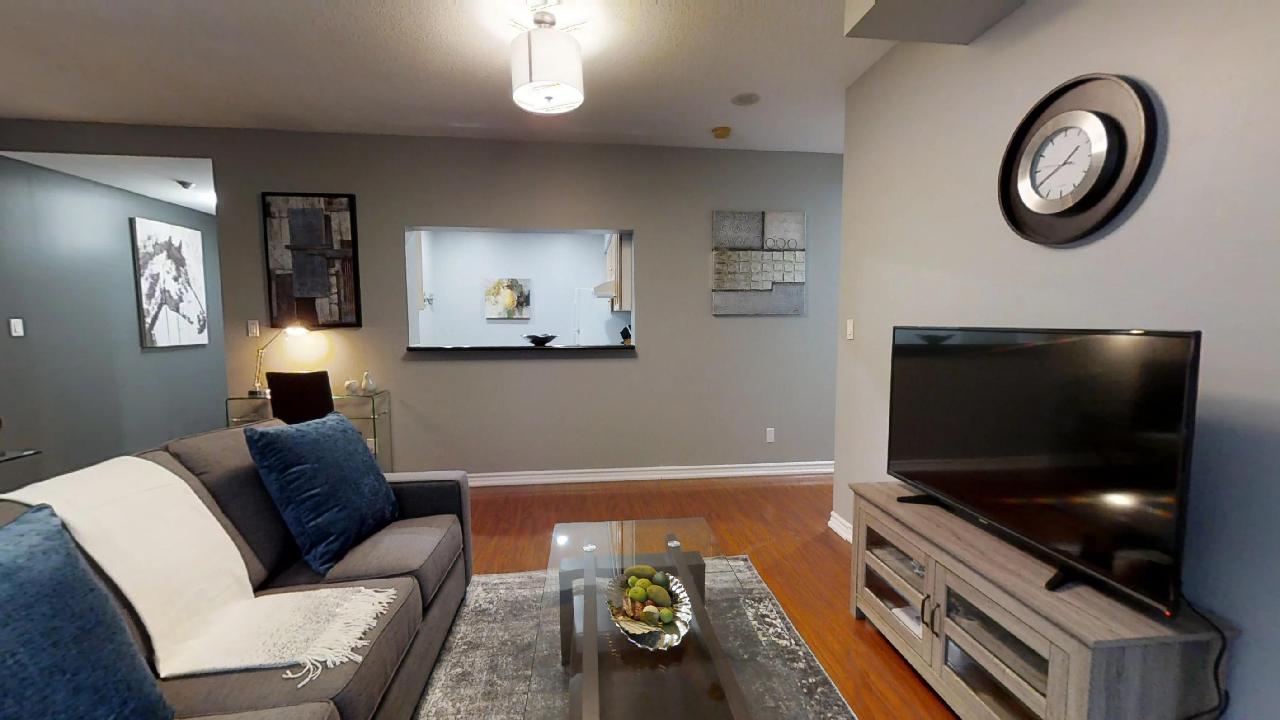 the living room in a furnished condo suite in Toronto, near note bene restaurant