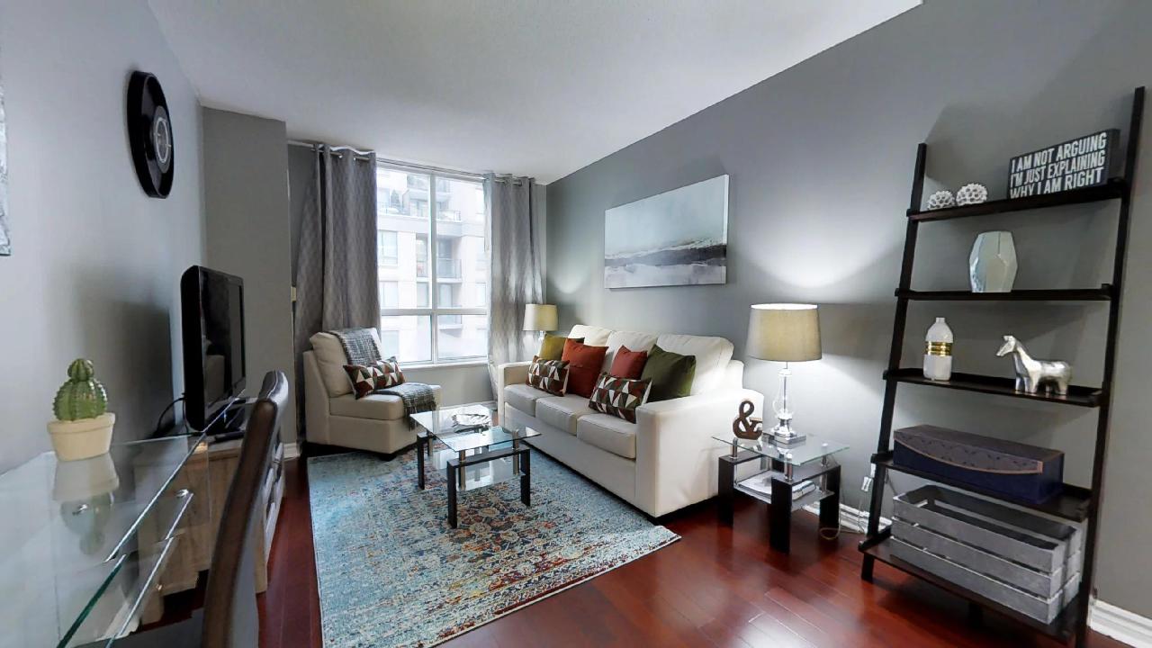 living room in toronto (near osgoode station) with dark red hardwood floor