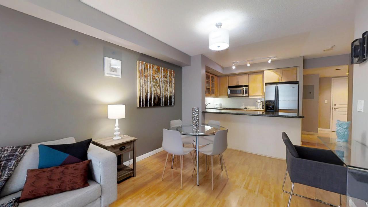 dining table in a toronto extended stay suite at Osgoode station