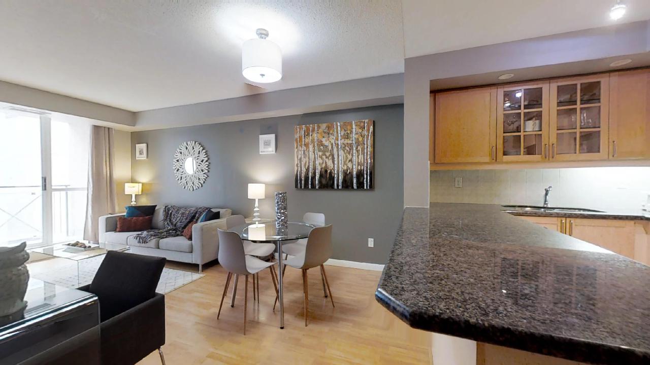 The dining table and wall art in furnished apartment in Toronto, near Osgoode station