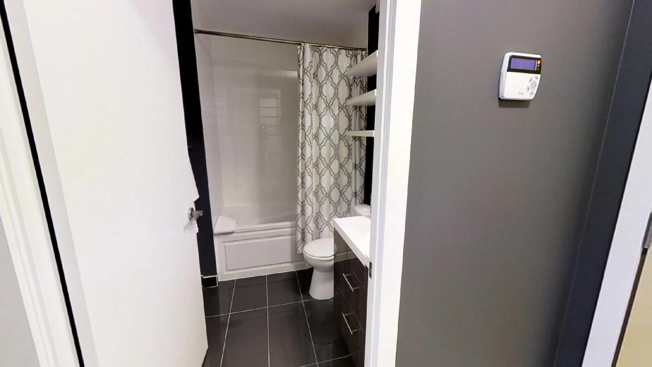 the bathroom and shower of a toronto furnished apartment in downtown